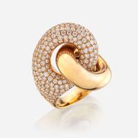 An eighteen karat gold and diamond ring