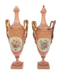 A Pair of Sèvres Style Parcel Gilt and "Jeweled" Porcelain Covered Urns