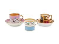 Two Vienna Painted and Parcel Gilt Porcelain Teacup and Saucer Sets and an Additional Vienna Porcelain Teacup