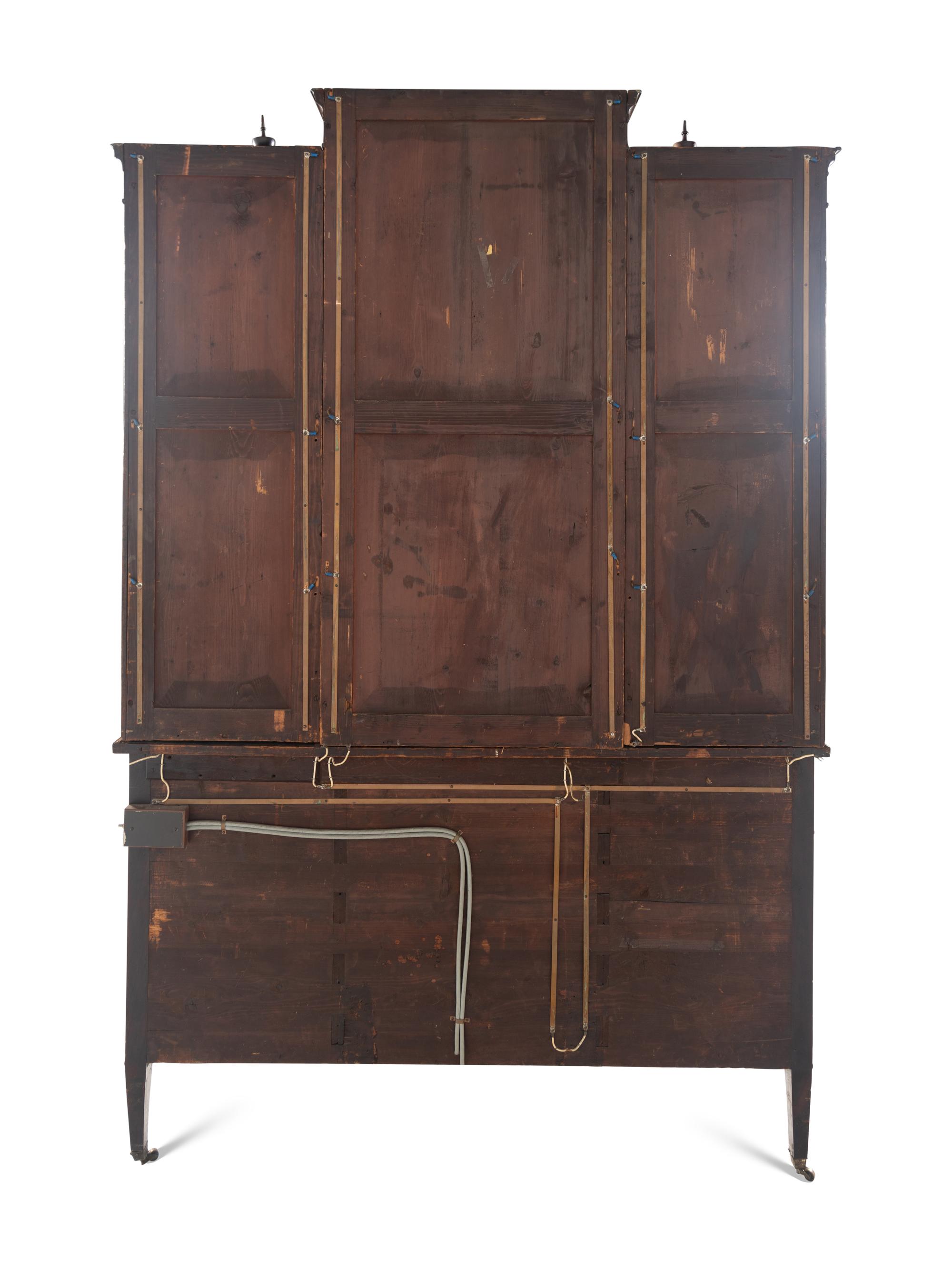 An Edwardian Inlaid Mahogany Breakfront Cabinet