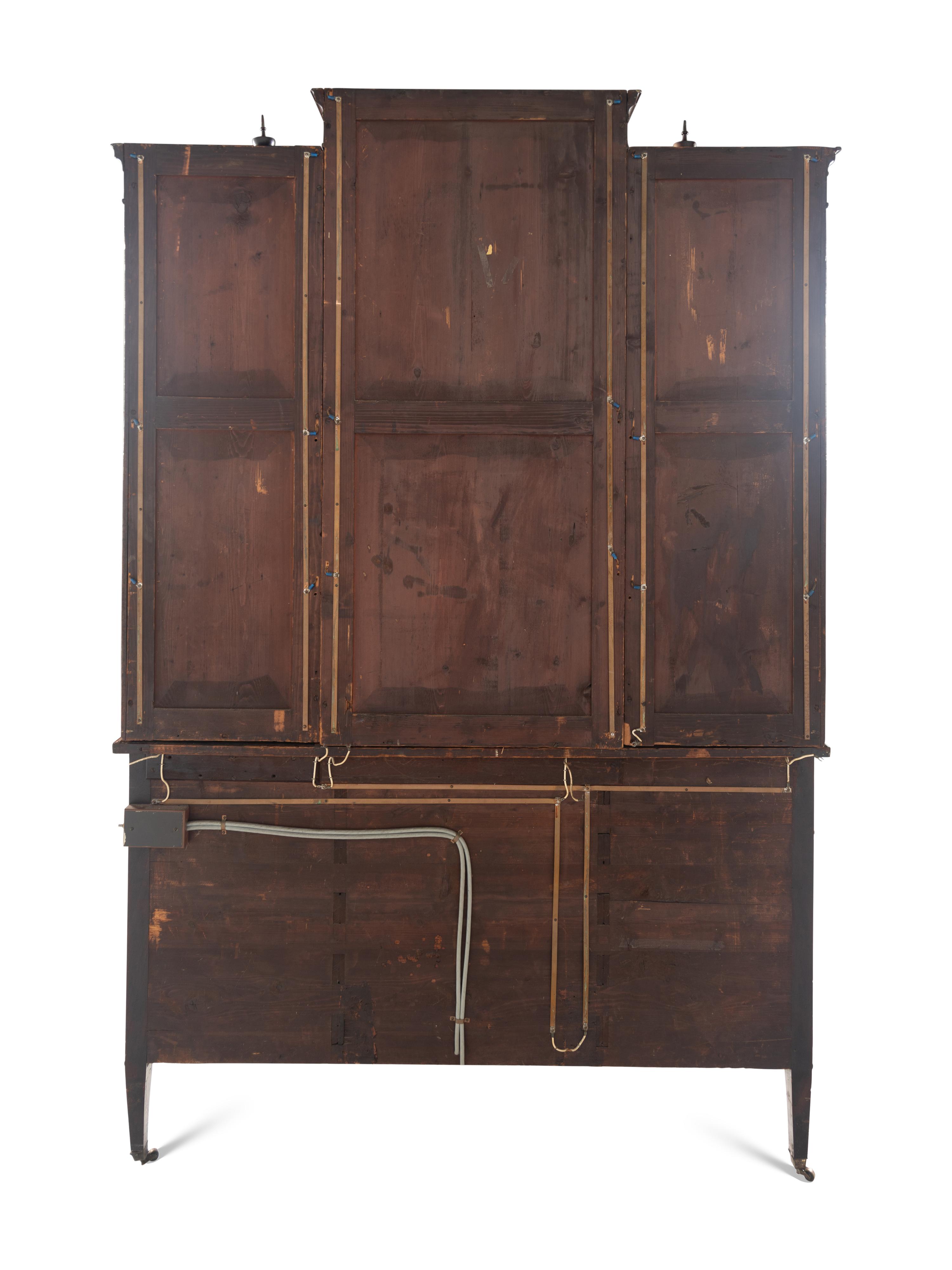 An Edwardian Inlaid Mahogany Breakfront Cabinet