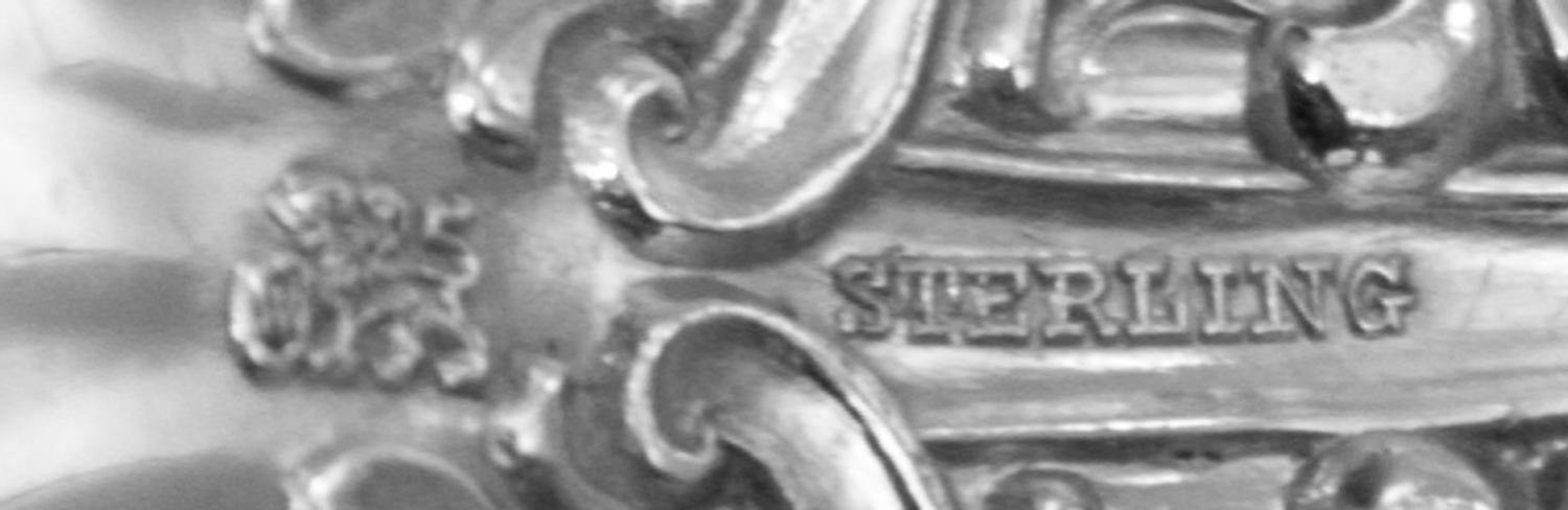 An American Silver Flatware Service, Whiting Mfg. Co., New York, NY, Lily pattern, comprising: 12 dinner knives 12 dinner forks 20 lunc