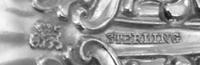 An American Silver Flatware Service, Whiting Mfg. Co., New York, NY, Lily pattern, comprising: 12 dinner knives 12 dinner forks 20 lunc