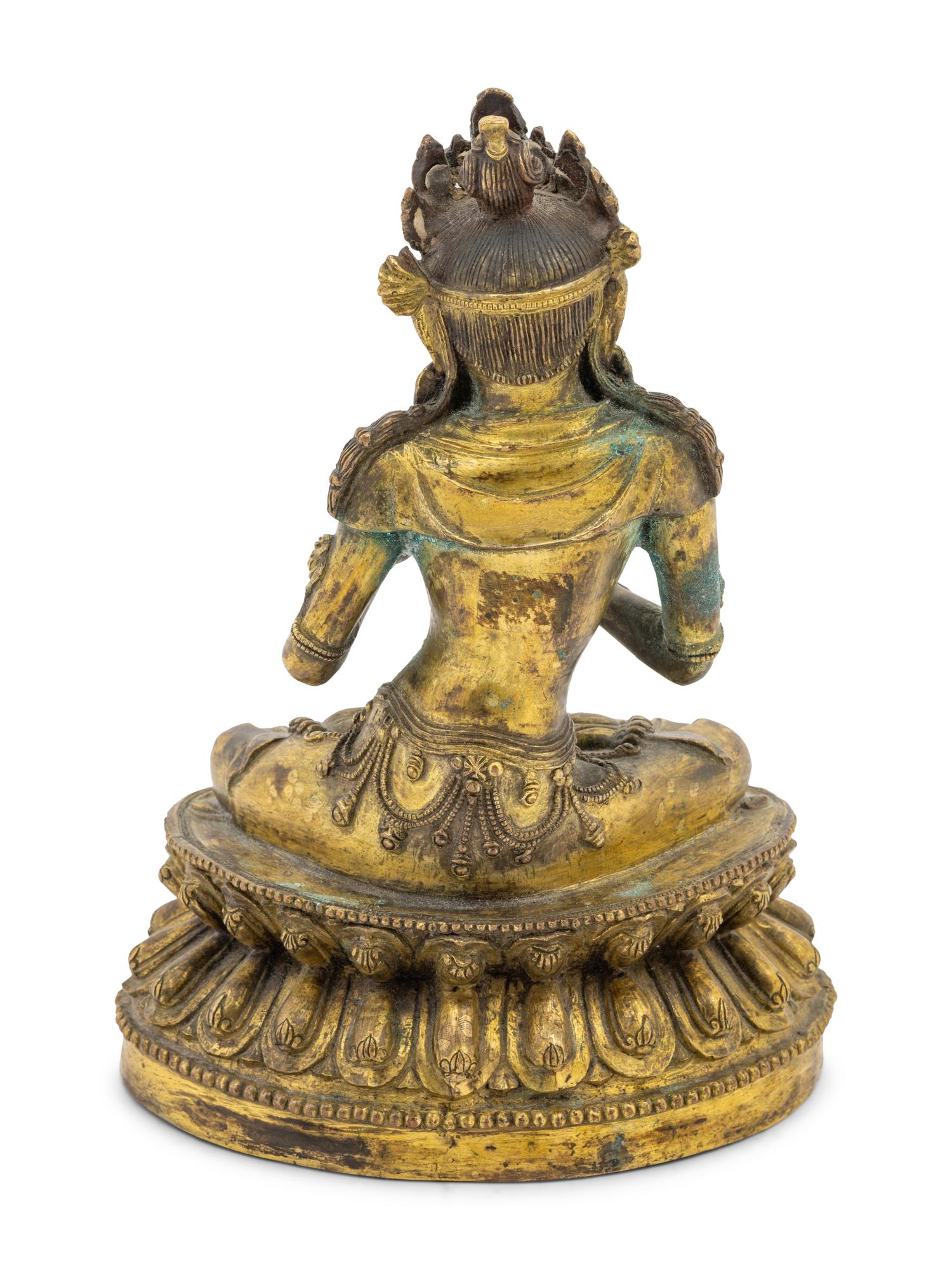 An Unusual Gilt Bronze Figure of Seated Maitreya