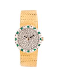 CORUM, 18K YELLOW GOLD, DIAMOND AND EMERALD WATCH
