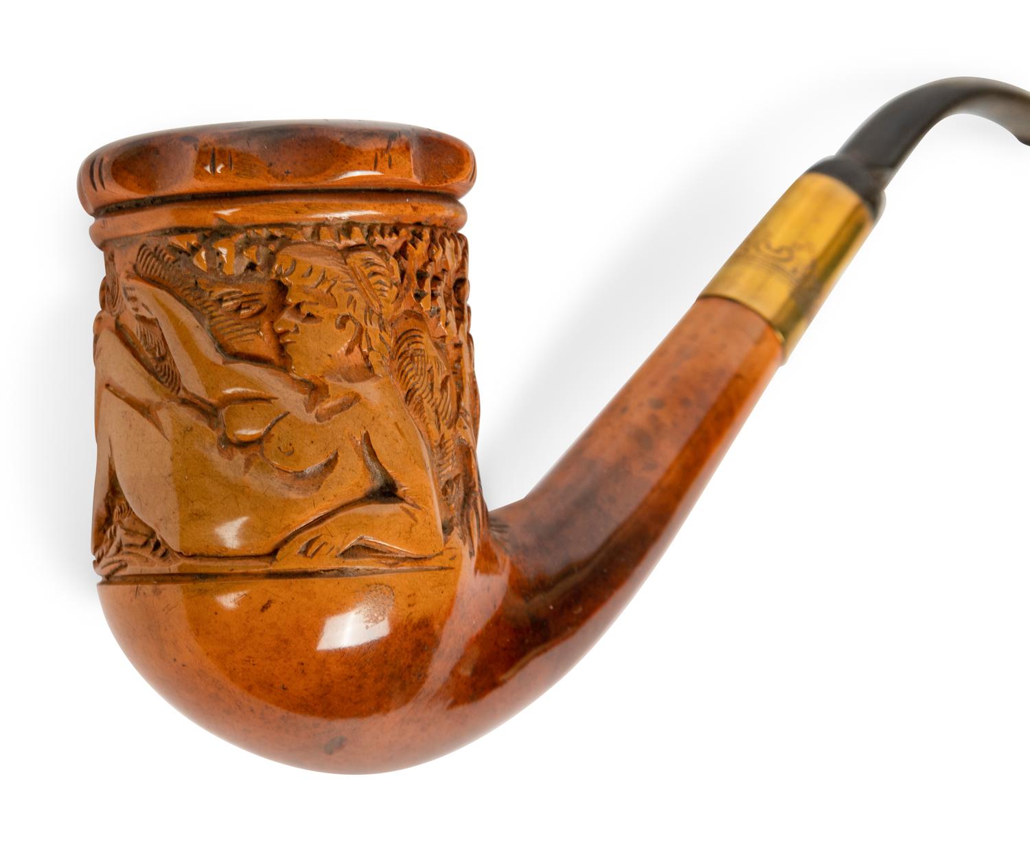A Group of Nine Carved Meerschaum and Wooden Pipes