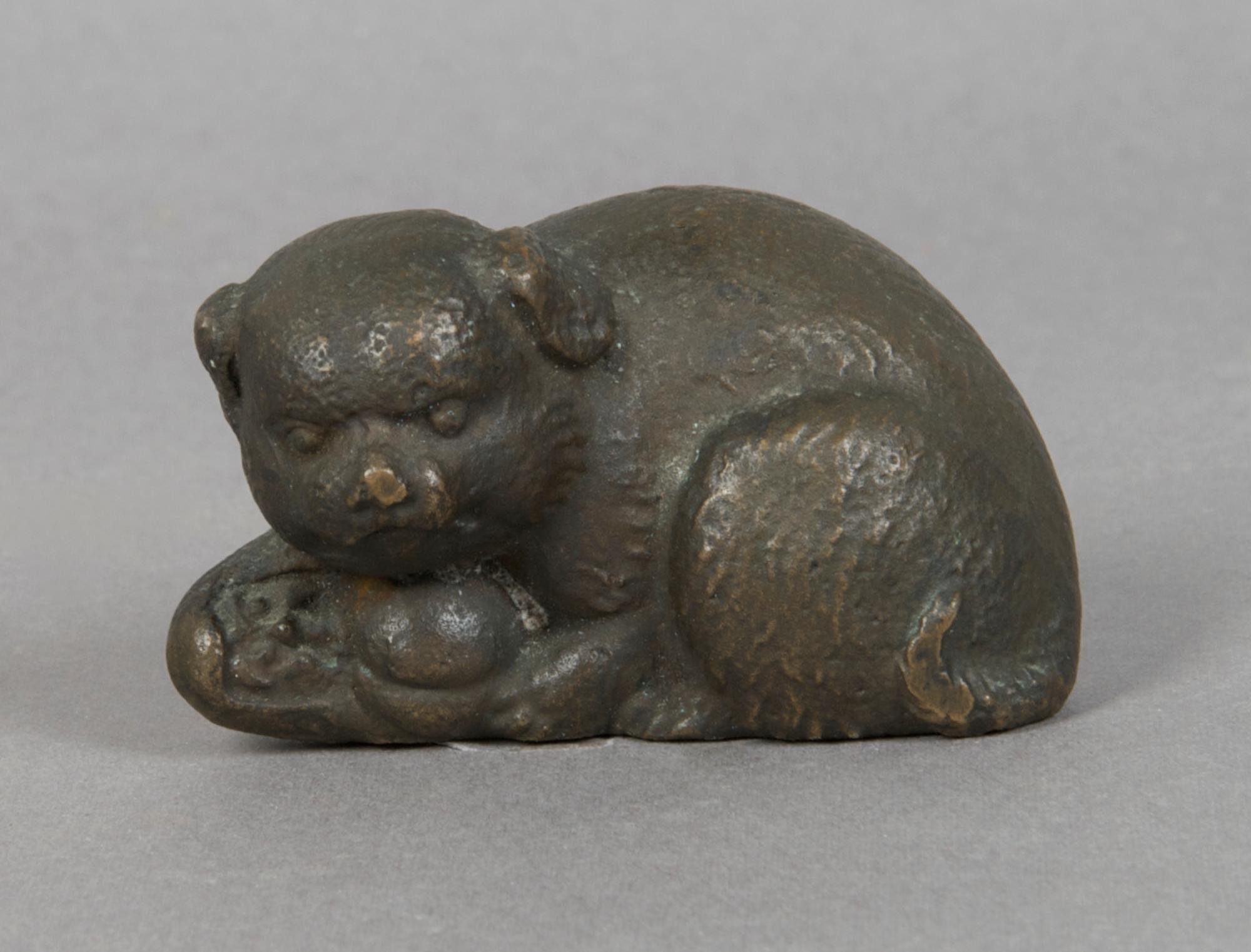 A Tiffany Studios Bronze Paperweight, Length 2 1/2 inches.