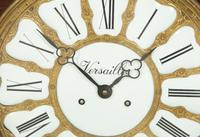 A Louis XV Style Gilt Bronze Mounted Bracket Clock
