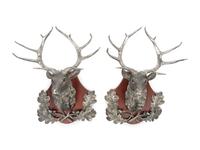 A Pair of Silvered Metal Hunting Trophies