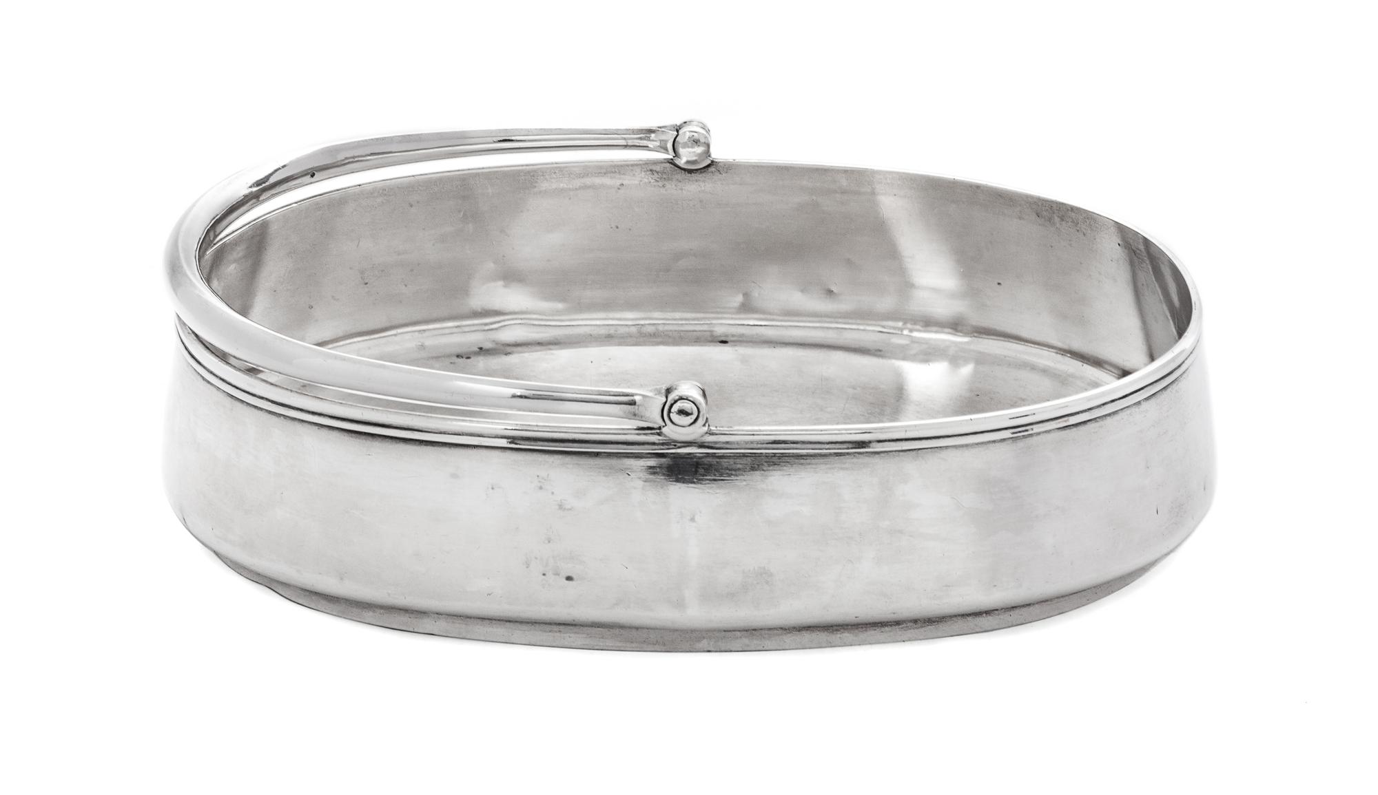 A Russian Silver Basket, St. Petersburg, Late 19th Century, with a swing handle.