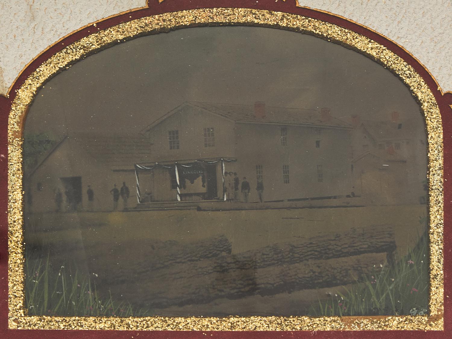 [Lincoln, Abraham]. A group of 3 photographs showing buildings and monuments draped in mourning.