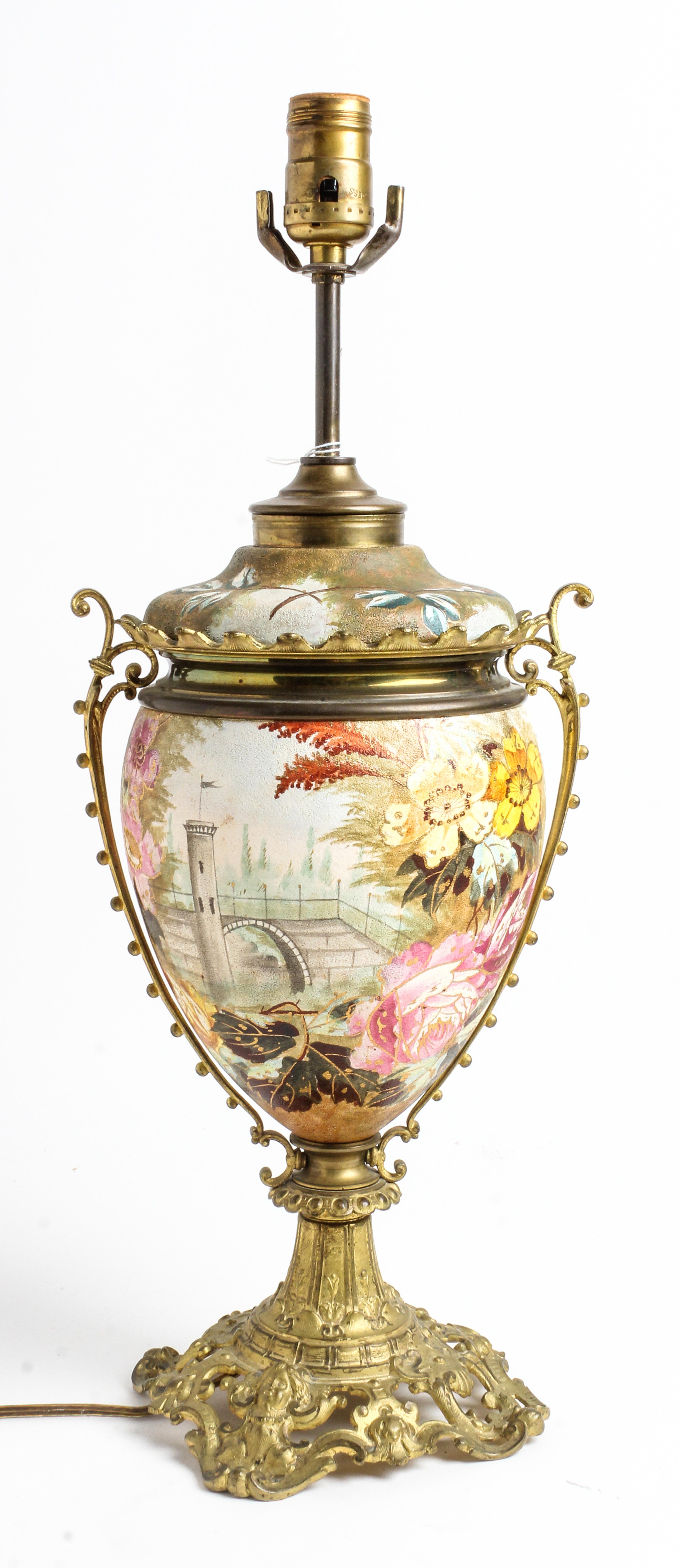 A French Painted Metal Urn Height overall 21 inches. — 19TH CENTURY