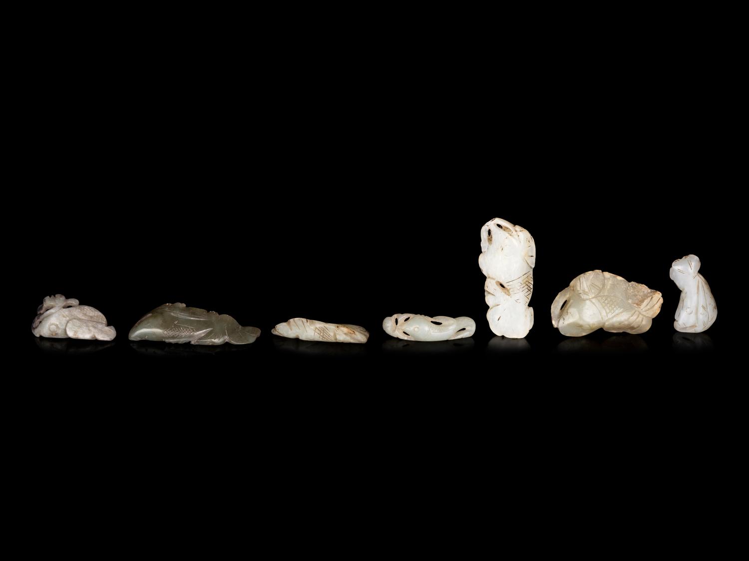 Seven Chinese Celadon Jade Carvings of Fish