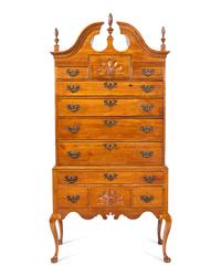 A Queen Anne Carved Walnut High Chest Of Drawers