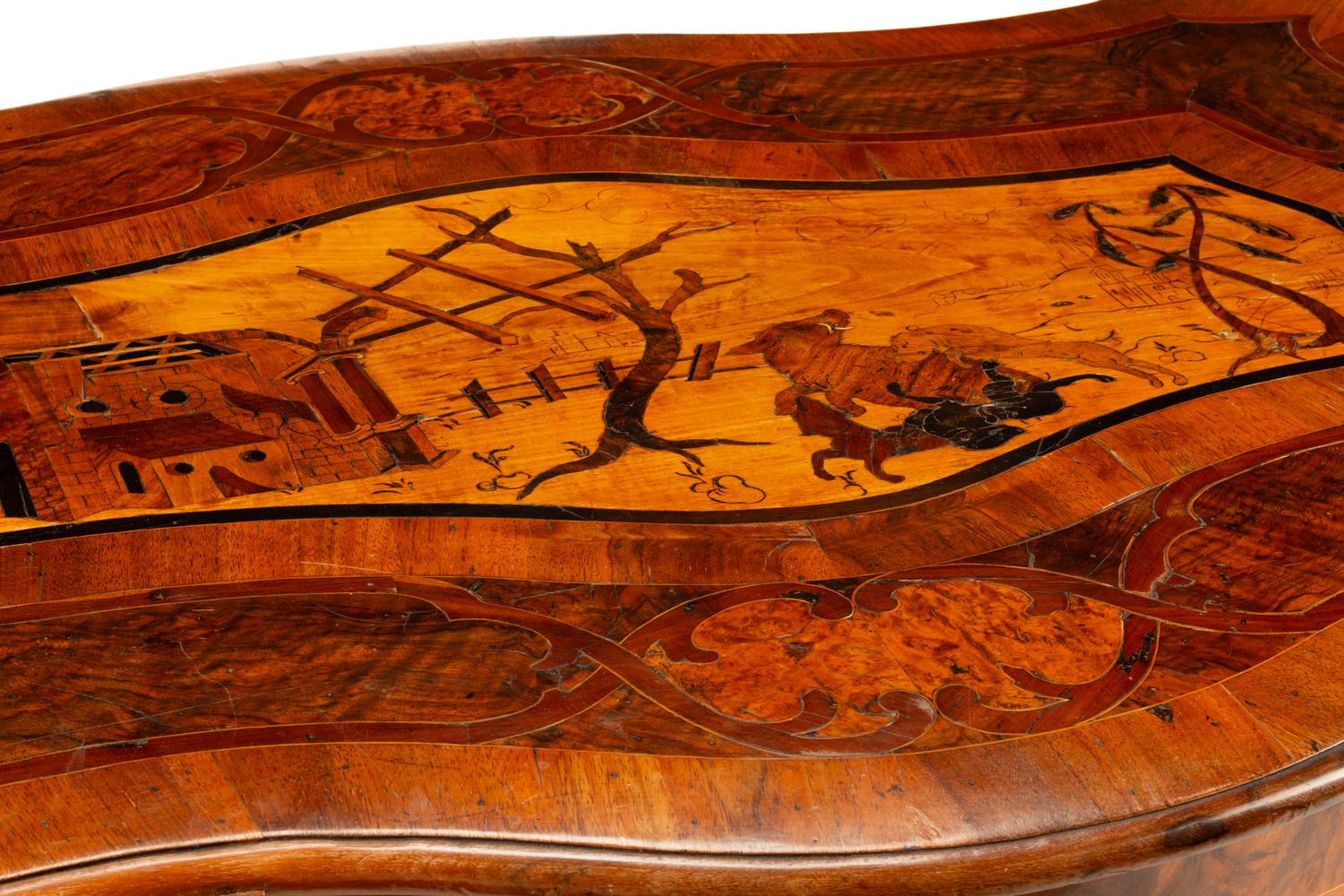 A Continental Walnut and Marquetry Table