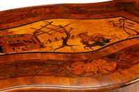 A Continental Walnut and Marquetry Table