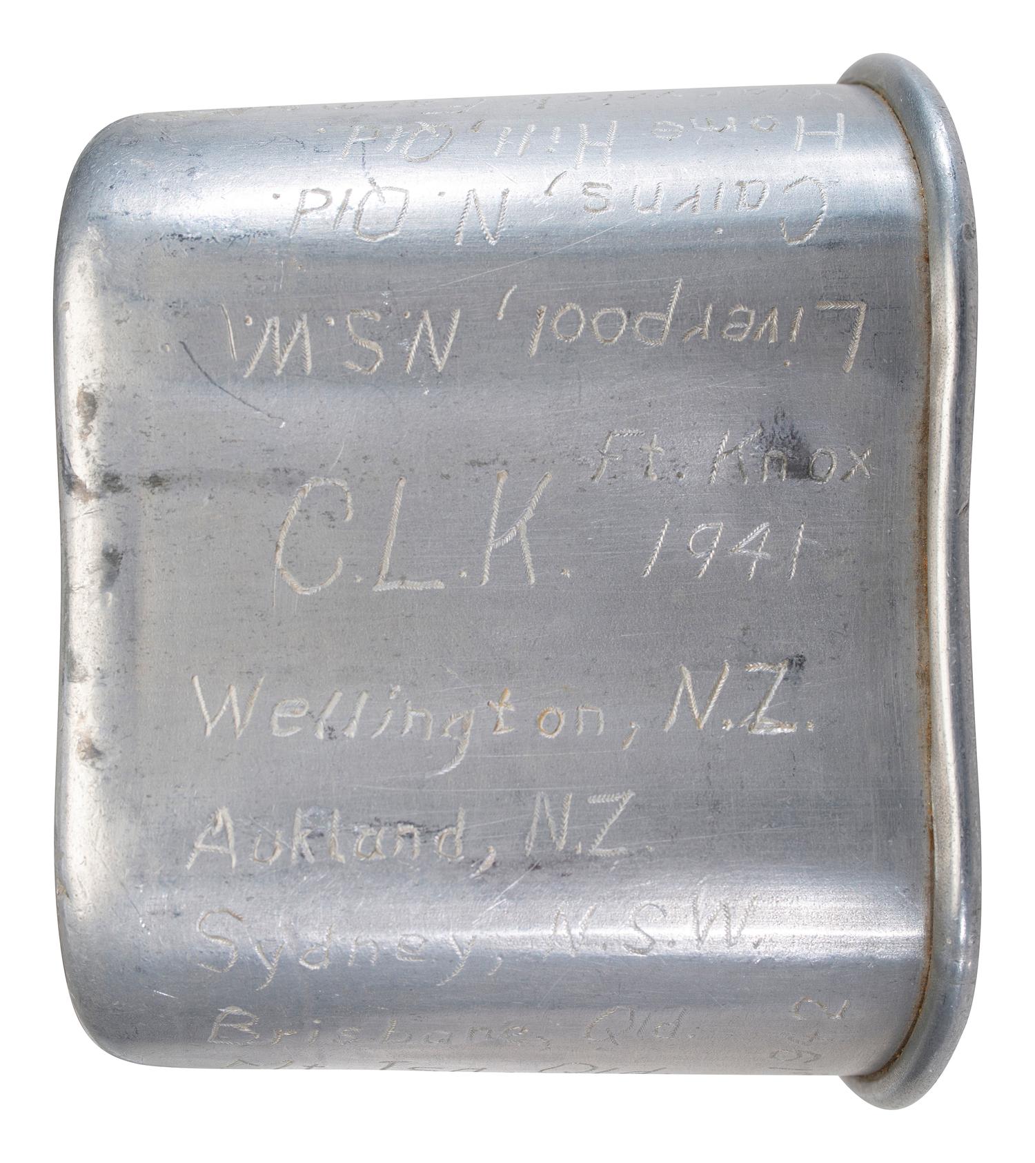[MILITARIA]. World War II and Korean War-era canteens, canteen covers, and mess kits.