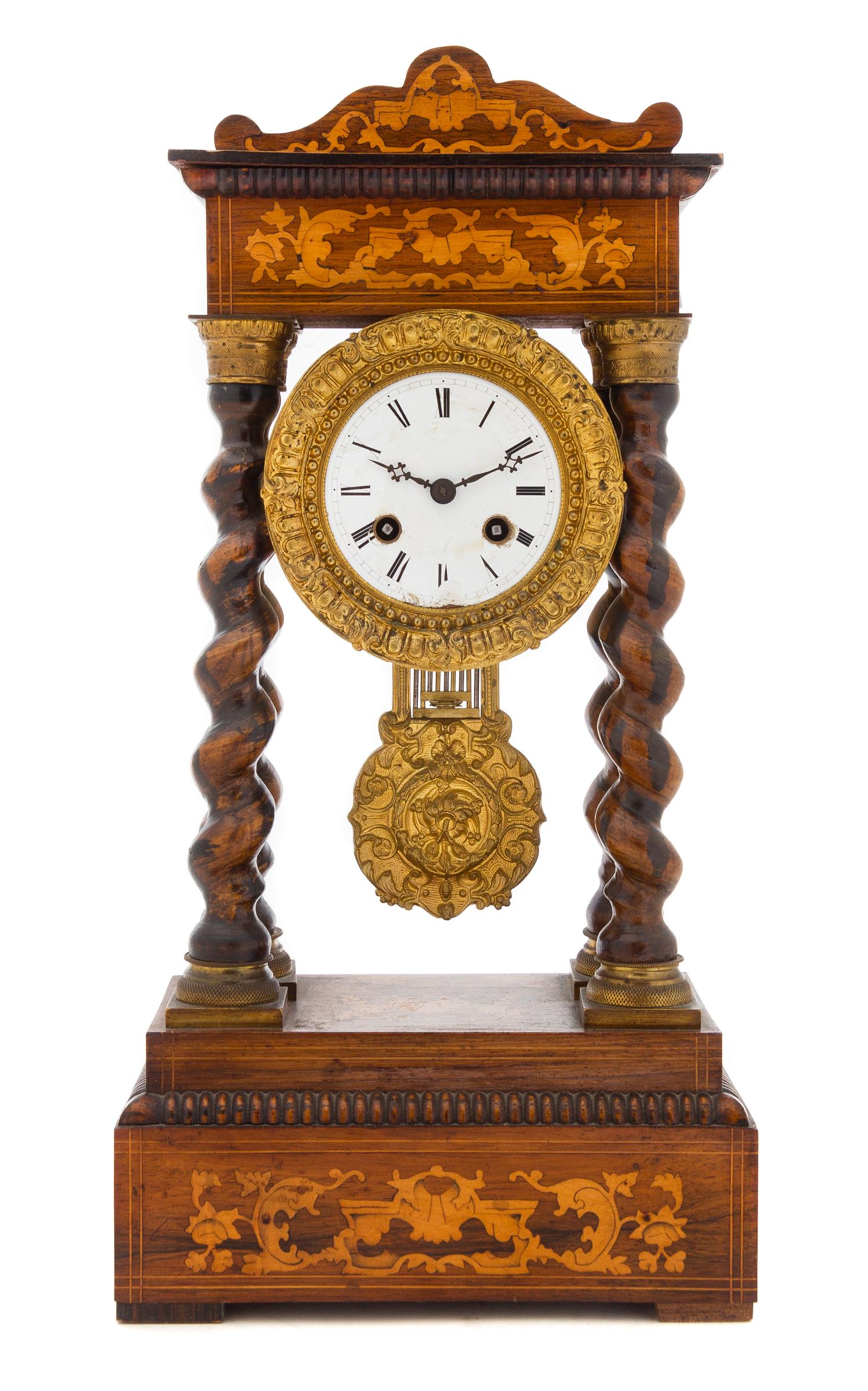 A Napoleon III Marquetry Portico Clock Height 17 inches. — SECOND QUARTER 19TH CENTURY