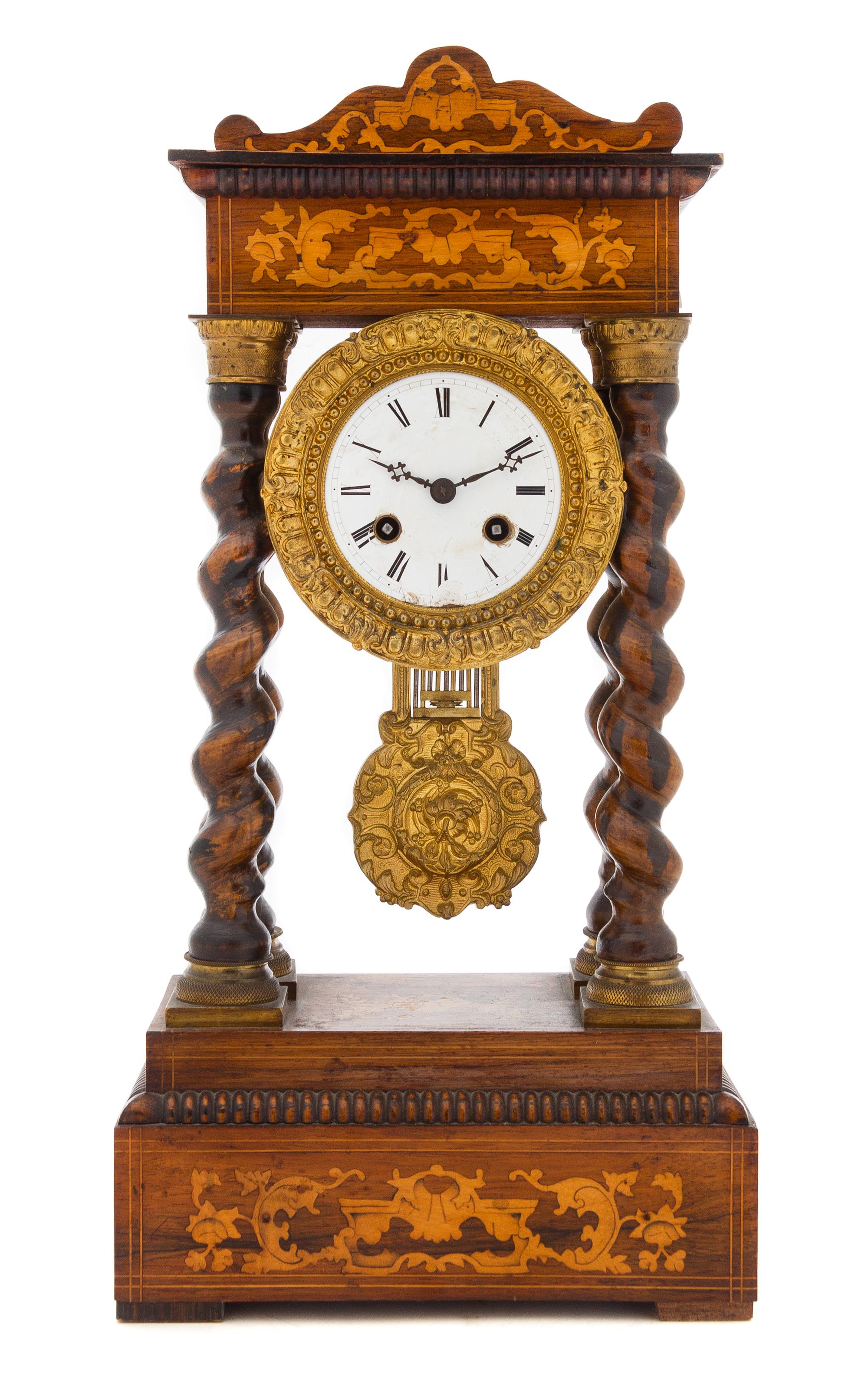 A Napoleon III Marquetry Portico Clock Height 17 inches. — SECOND QUARTER 19TH CENTURY