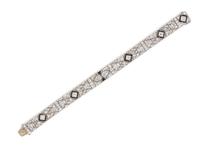 An Art Deco Platinum, Onyx and Diamond Bracelet, 23.35 dwts.
