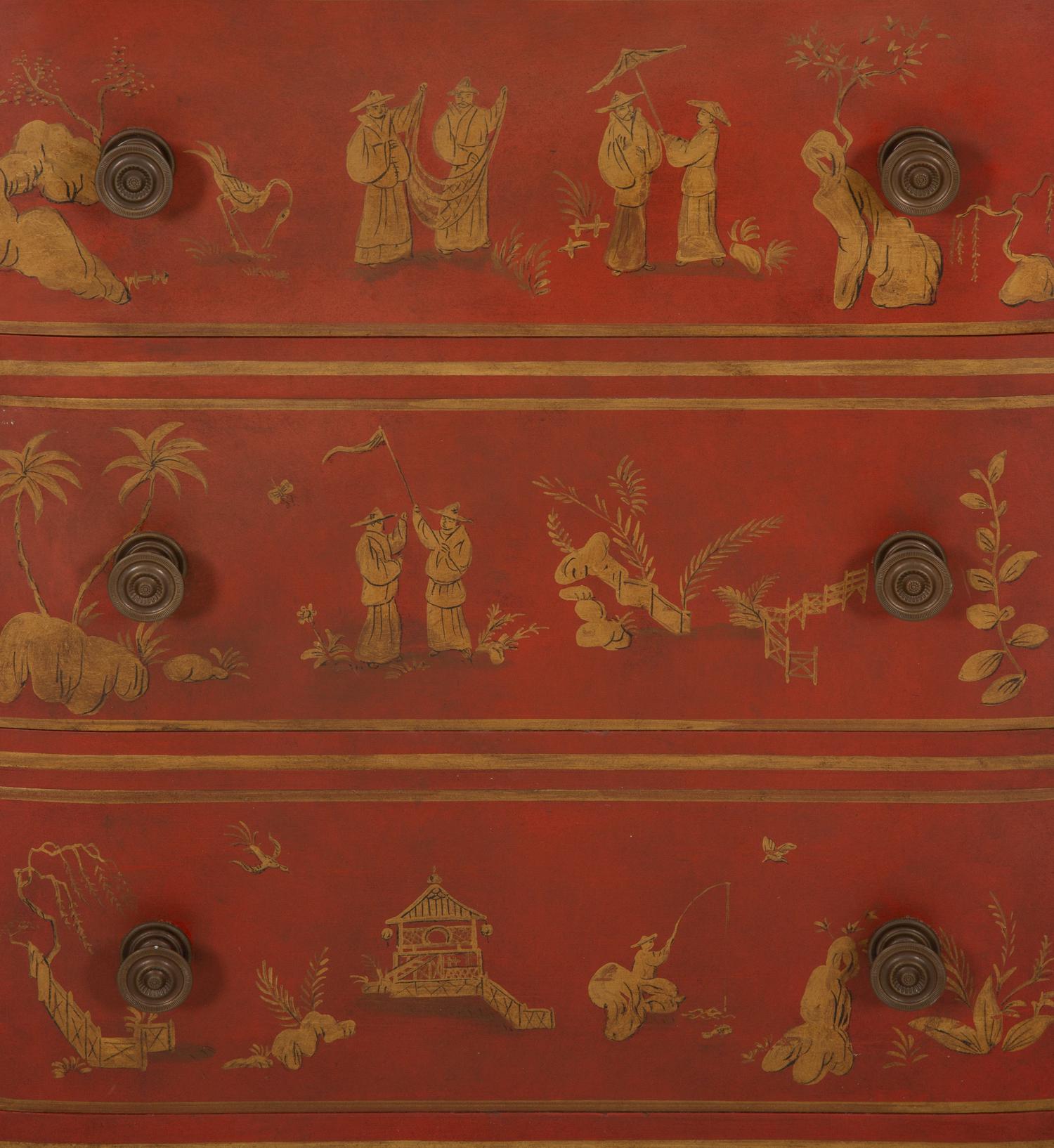 A Red and Gilt Chinoiserie Decorated Commode with Faux Marble Top