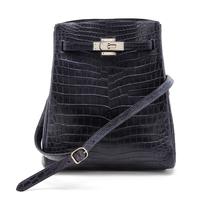 An Hermes 25cm Navy Niloticus Crocodile Kelly Sport Bag, 11 x 9 1/2 x 4 1/2 inches.