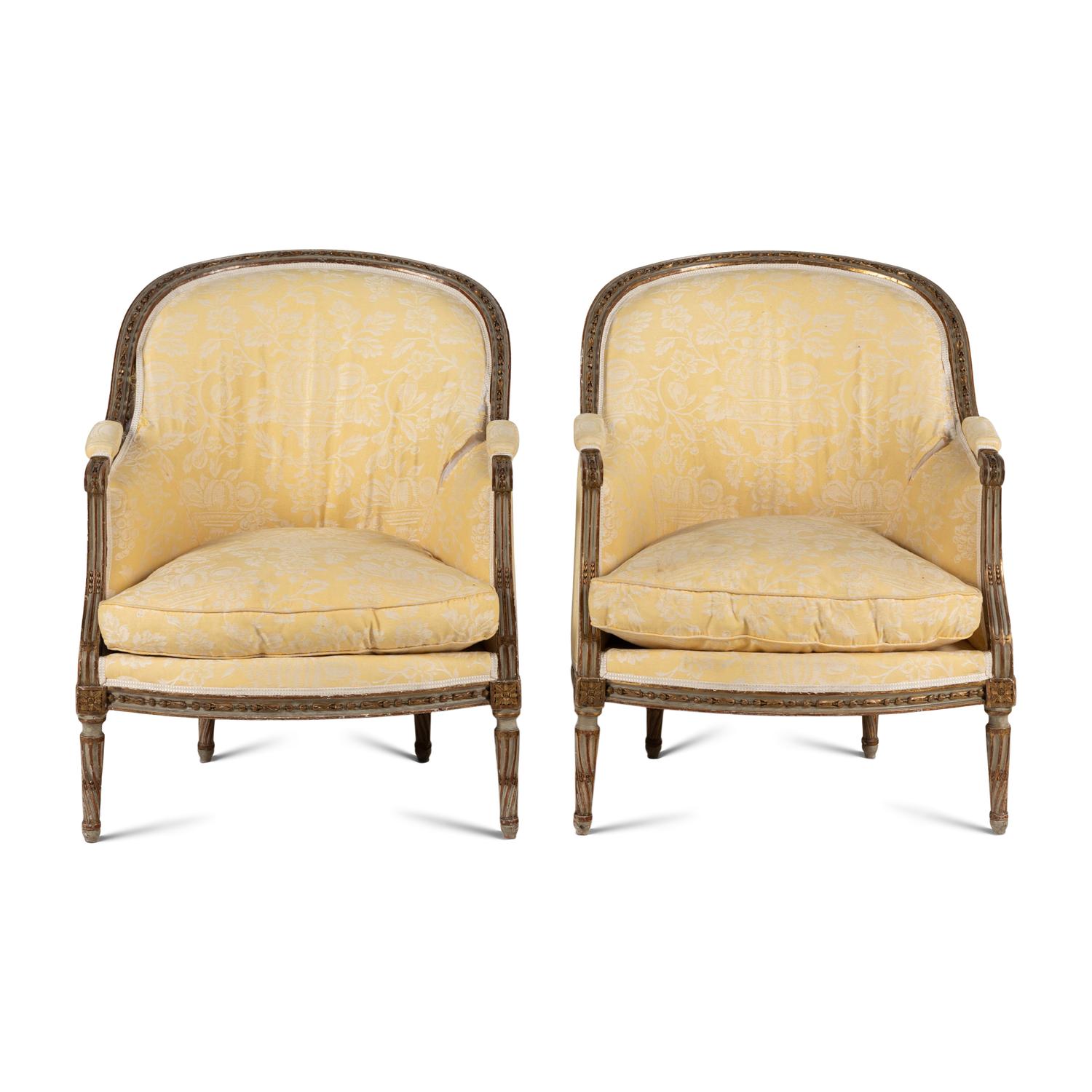 A Pair of Louis XVI Painted and Parcel Gilt Bergères