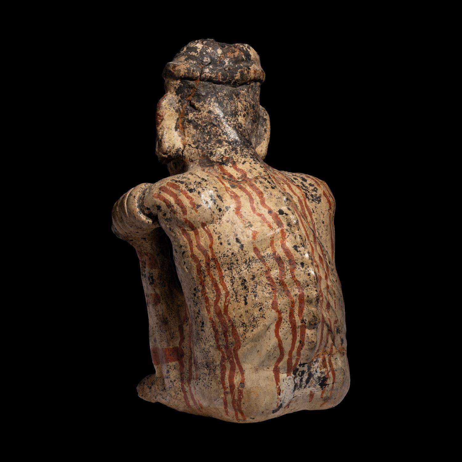 A Nayarit Seated Figure