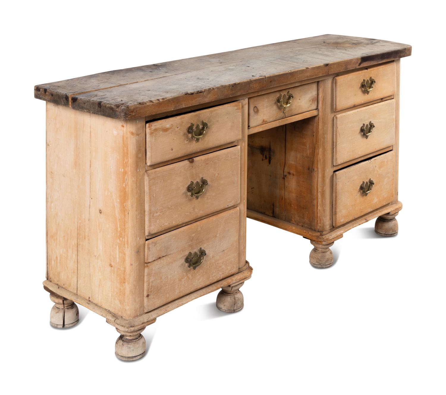 An English Pine Kneehole Dresser