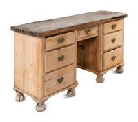 An English Pine Kneehole Dresser