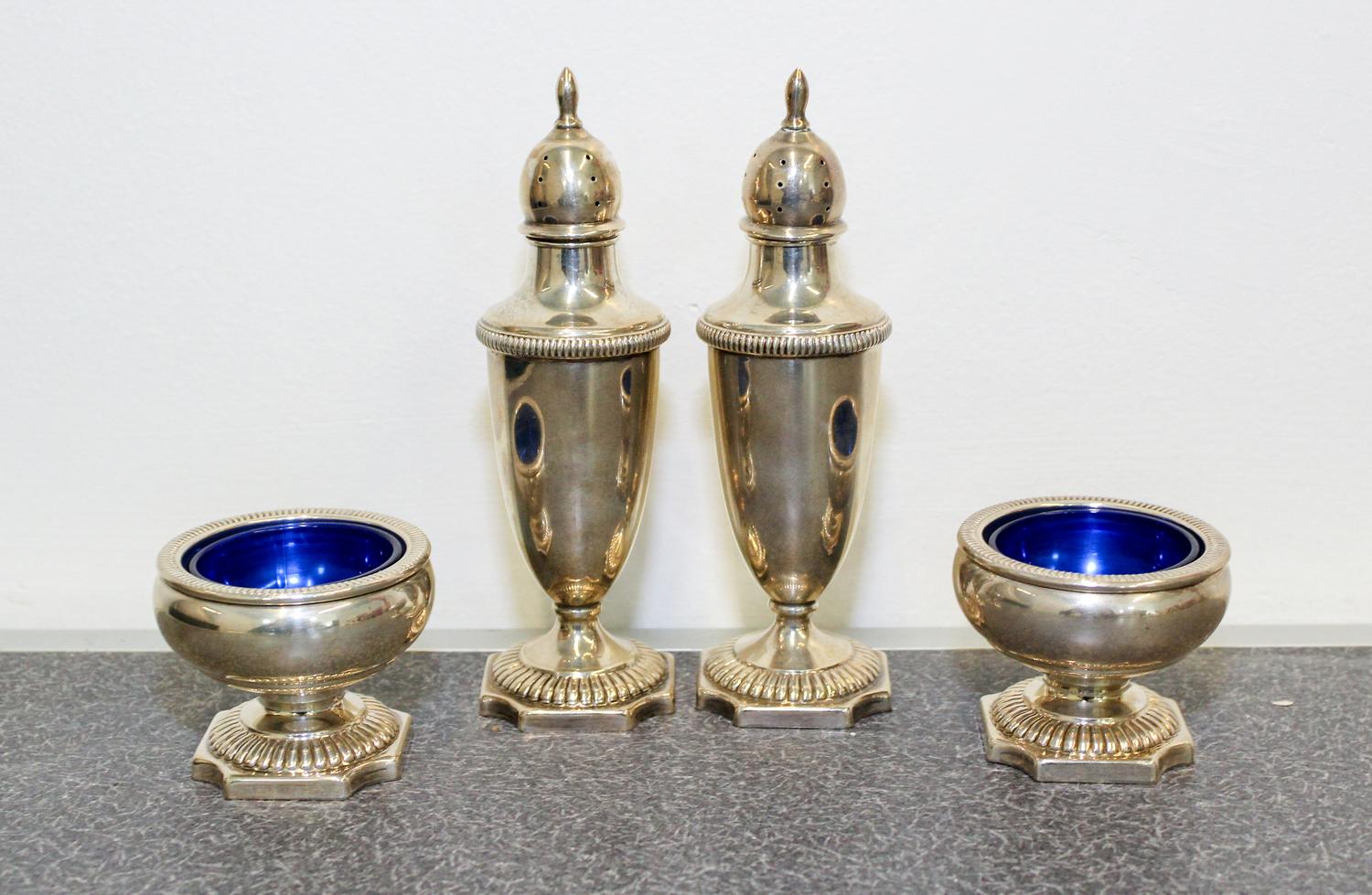 A Group of Four American Silver Table Articles, Fisher Silversmiths Inc., Jersey City, NJ, comprising a pair of casters and a pair of s