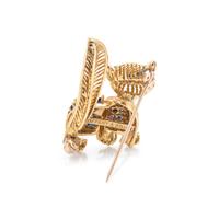TIFFANY & CO., YELLOW GOLD AND SAPPHIRE CAT BROOCH
