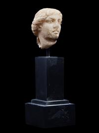 A Roman Marble Head of a Goddess