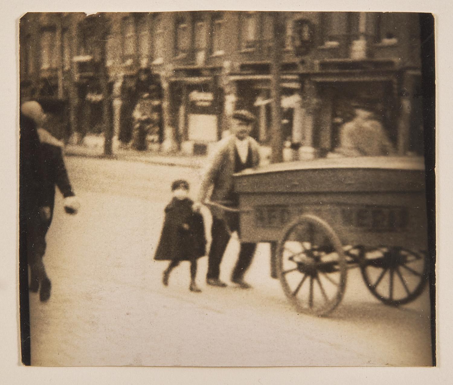 Man and Young Boy with Wagon