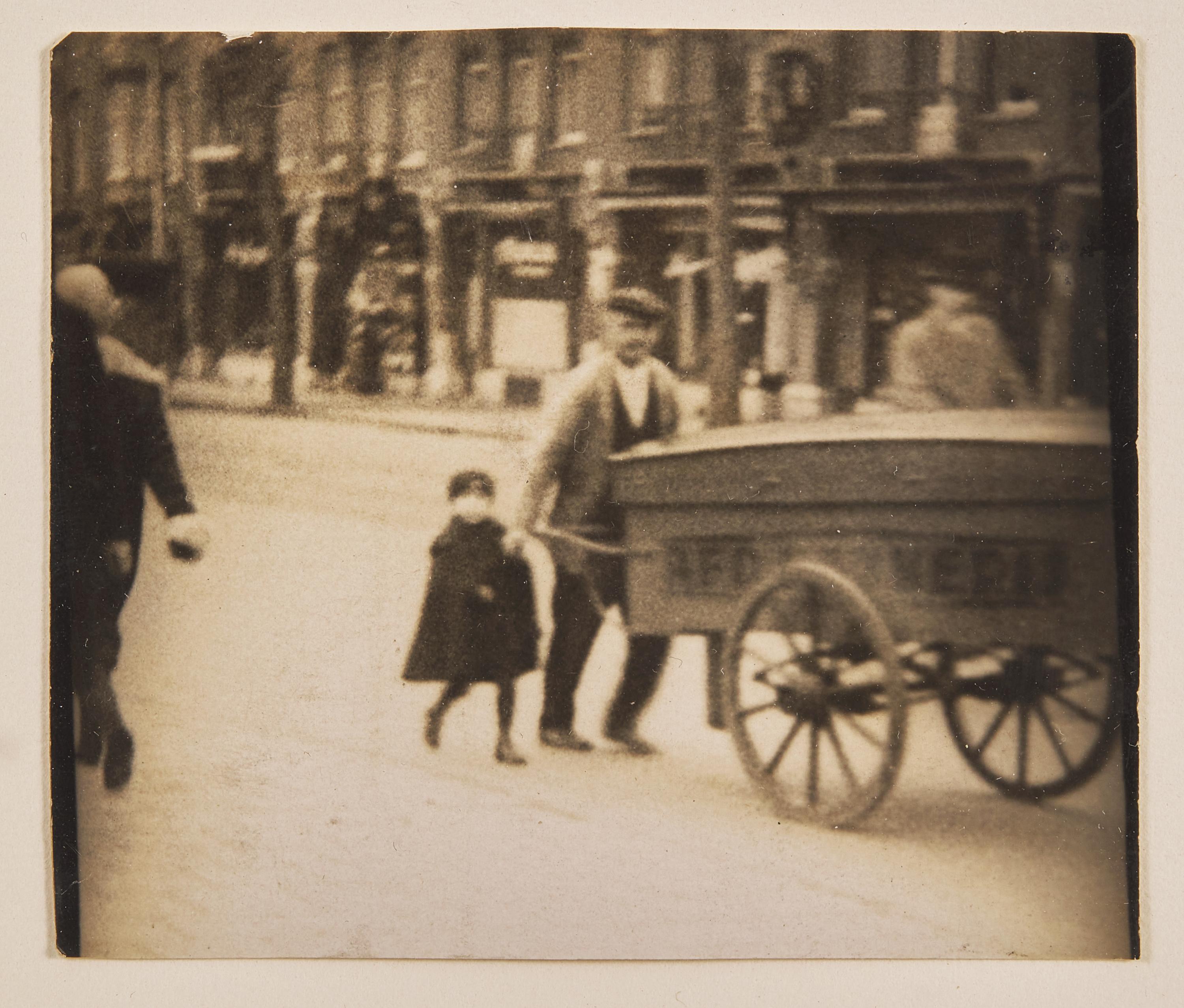 Man and Young Boy with Wagon