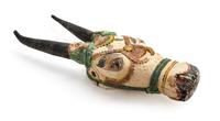 An Indonesian Polychrome Decorated Carved Wood Ceremonial Steer Head Height 37 x width 7 3/4 x depth 6 1/2 inches. — 20TH CENTURY