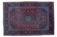 A Sarouk Wool Rug 9 feet 8 inches x 6 feet 7 inches.