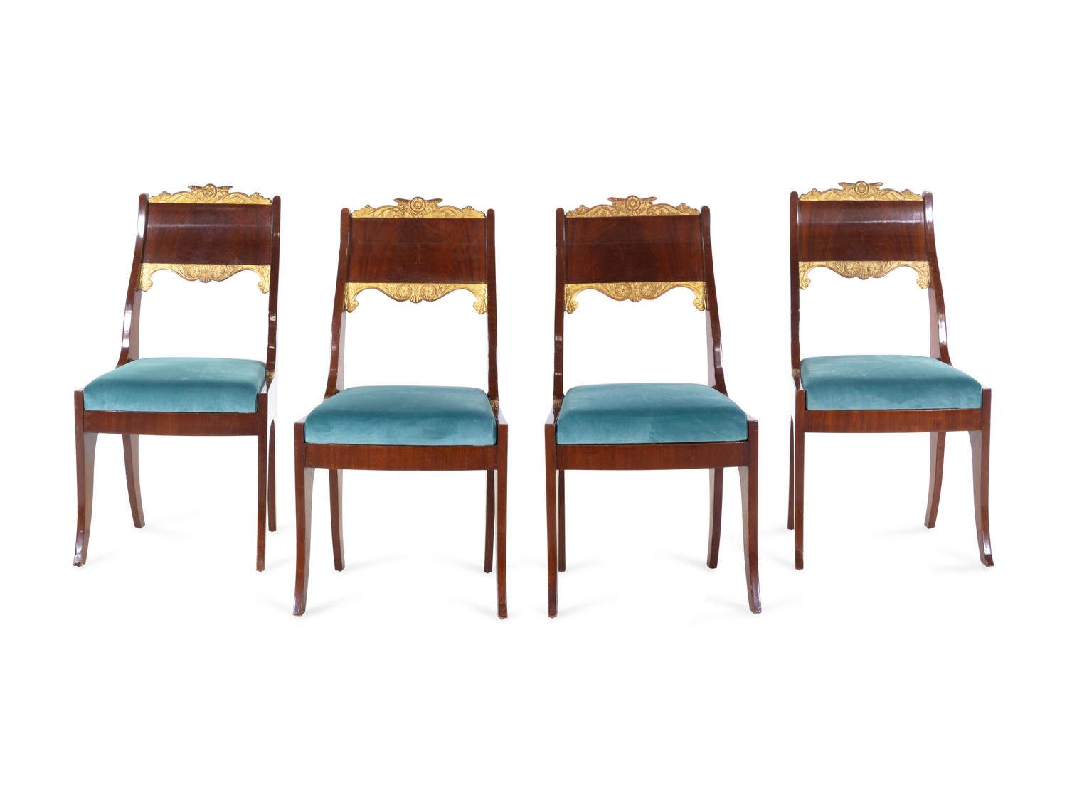 A Set of Four Russian Parcel Gilt Side Chairs