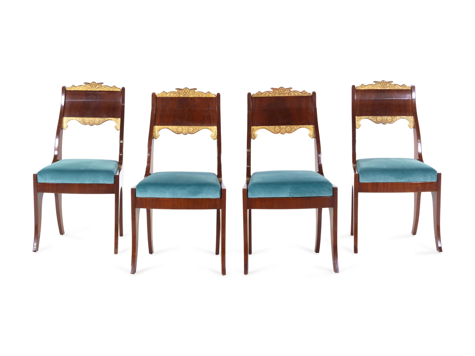 A Set of Four Russian Parcel Gilt Side Chairs