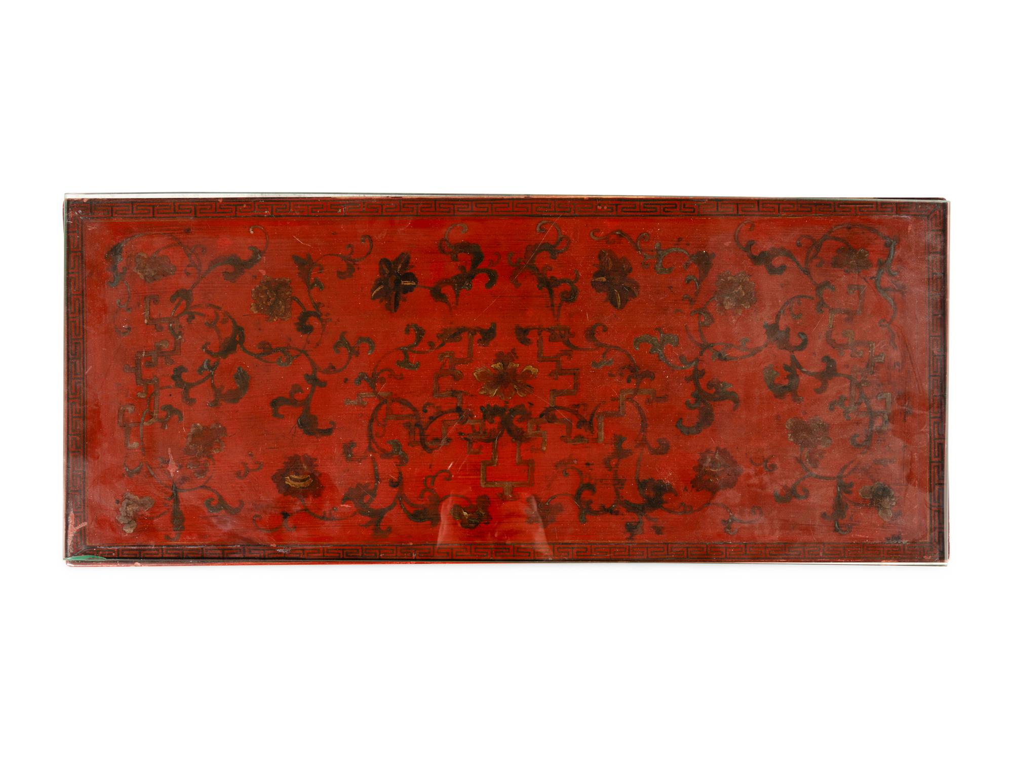 A Chinese Red Lacquered Low Table