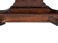 A Chippendale Carved and Figured Mahogany Armchair