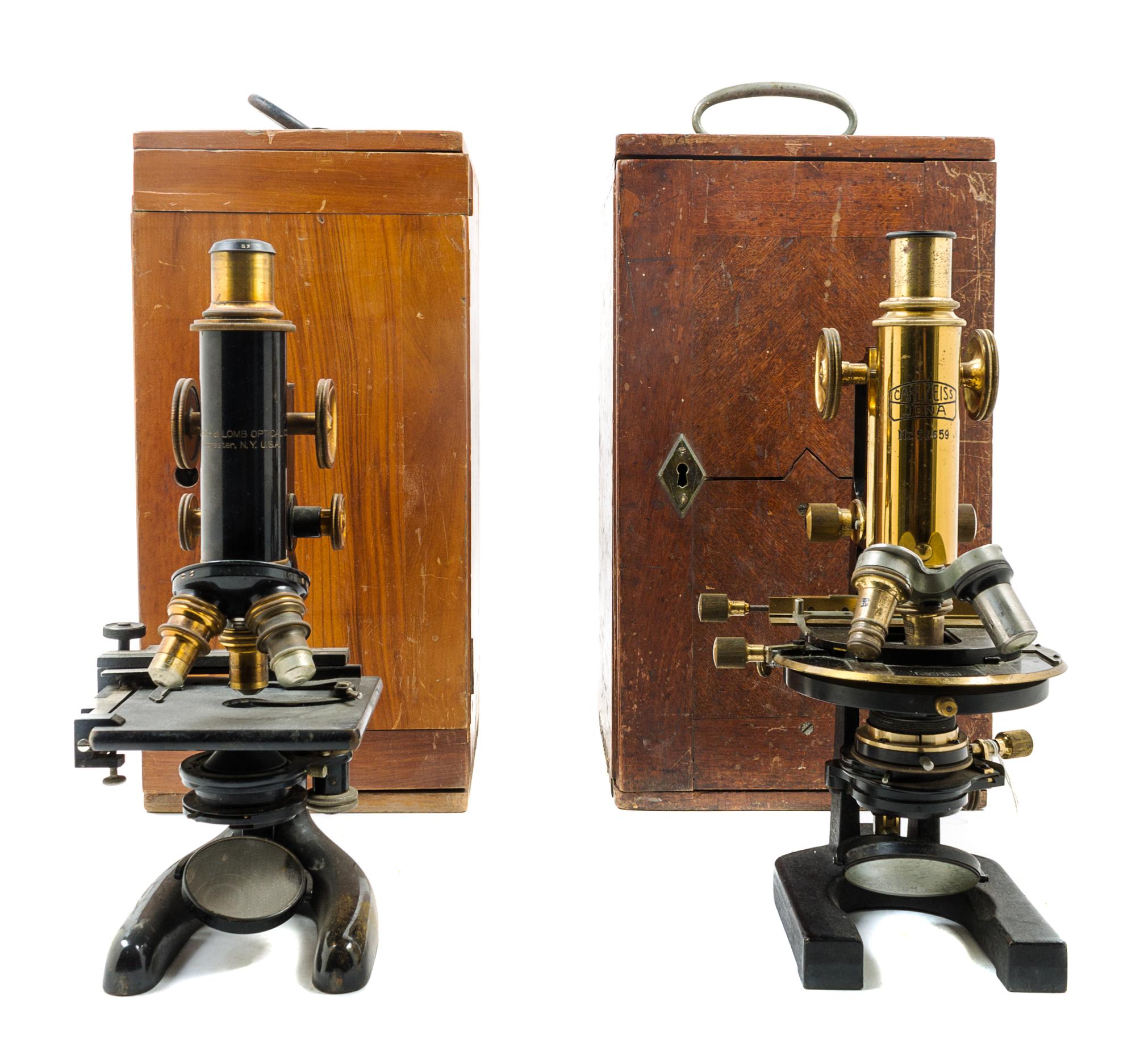Two Brass and Black Lacquered Microscopes Height of taller 12 1/4 inches. — CARL ZEISS, AND BAUSCH AND LOMB, LATE 19TH/EARLY 20TH CENTURY