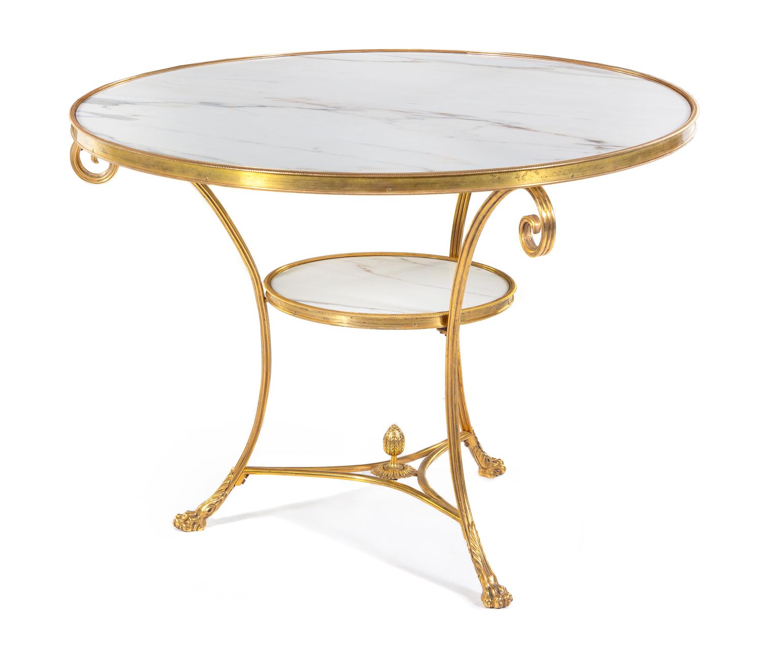 A Continental Gilt Bronze Gueridon Height 26 x diameter of top 33 inches. — 20TH CENTURY