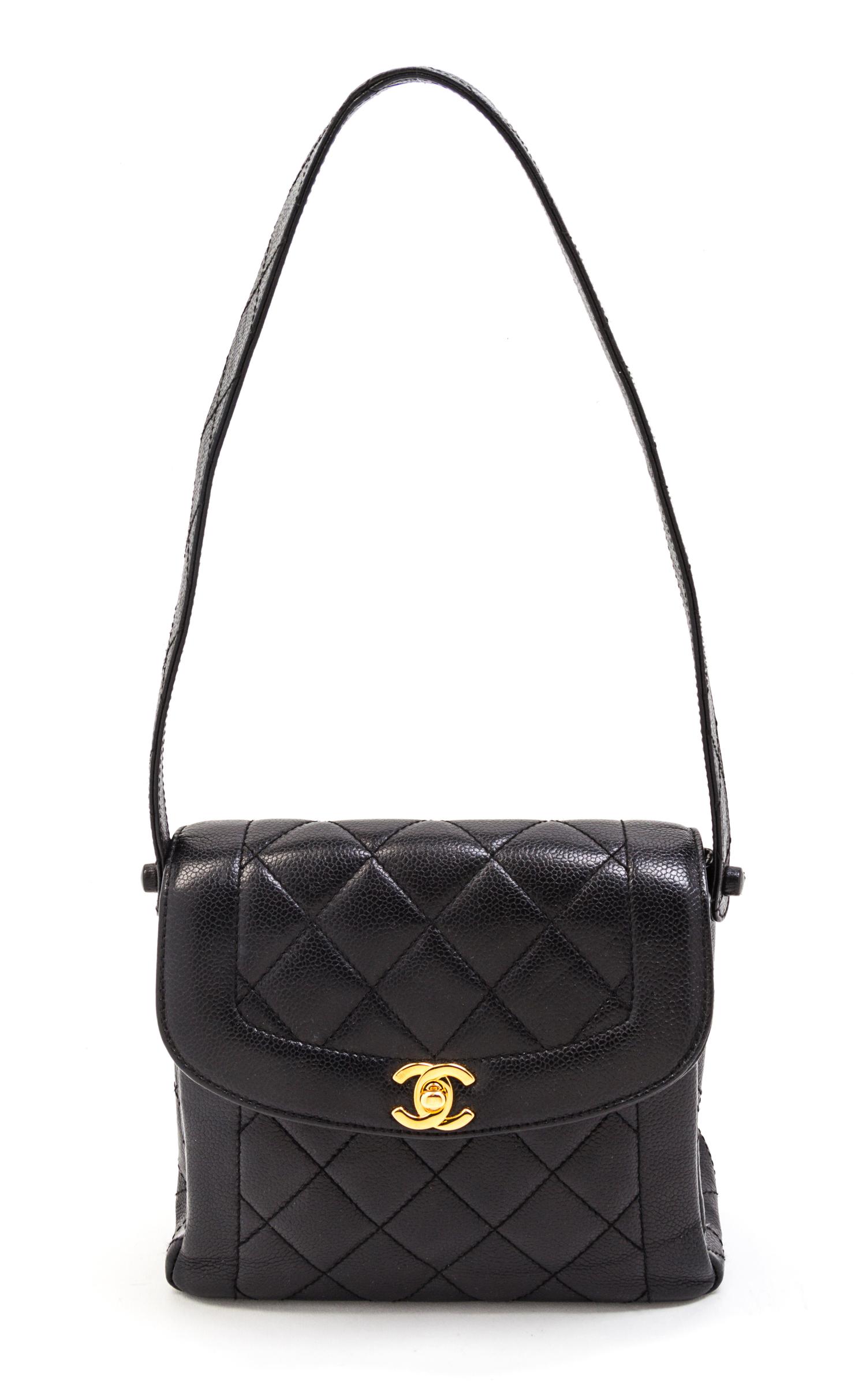 A Chanel Black Quilted Leather Bag. 8 x 7 1/2 x 3 inches.