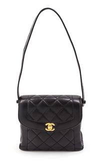 A Chanel Black Quilted Leather Bag. 8 x 7 1/2 x 3 inches.