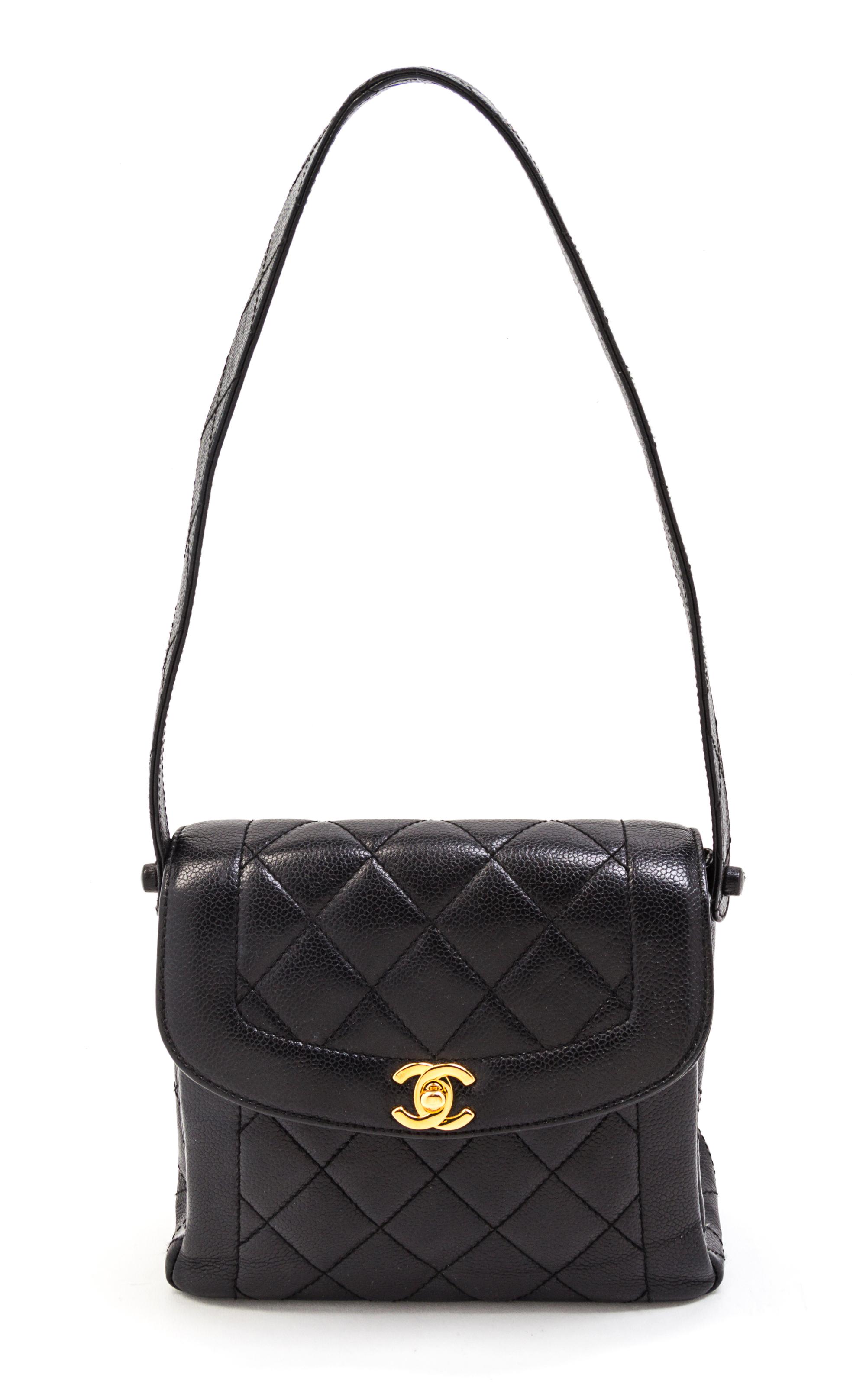 A Chanel Black Quilted Leather Bag. 8 x 7 1/2 x 3 inches.