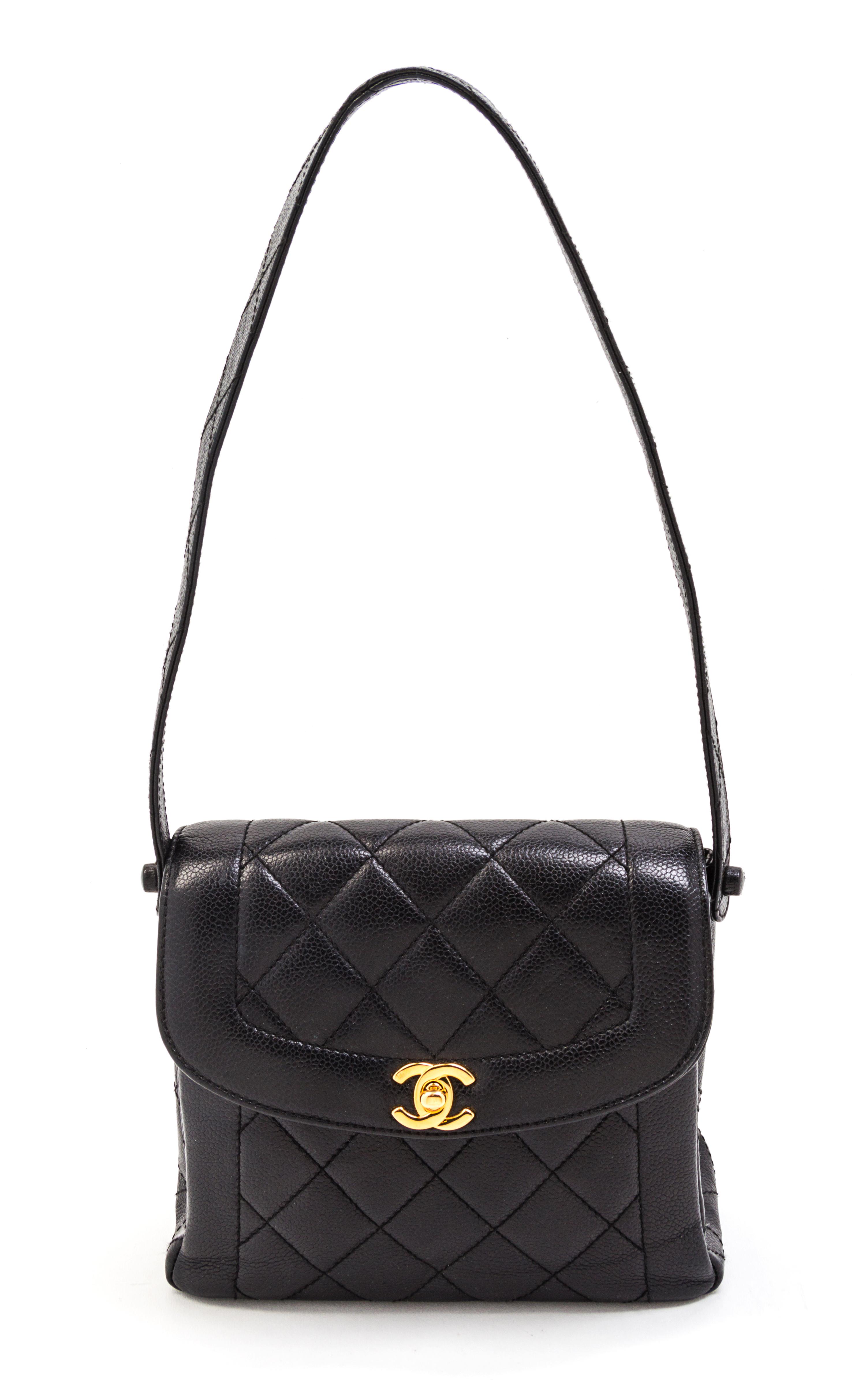 A Chanel Black Quilted Leather Bag. 8 x 7 1/2 x 3 inches.