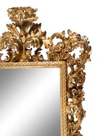 An Italian Baroque Style Giltwood Mirror