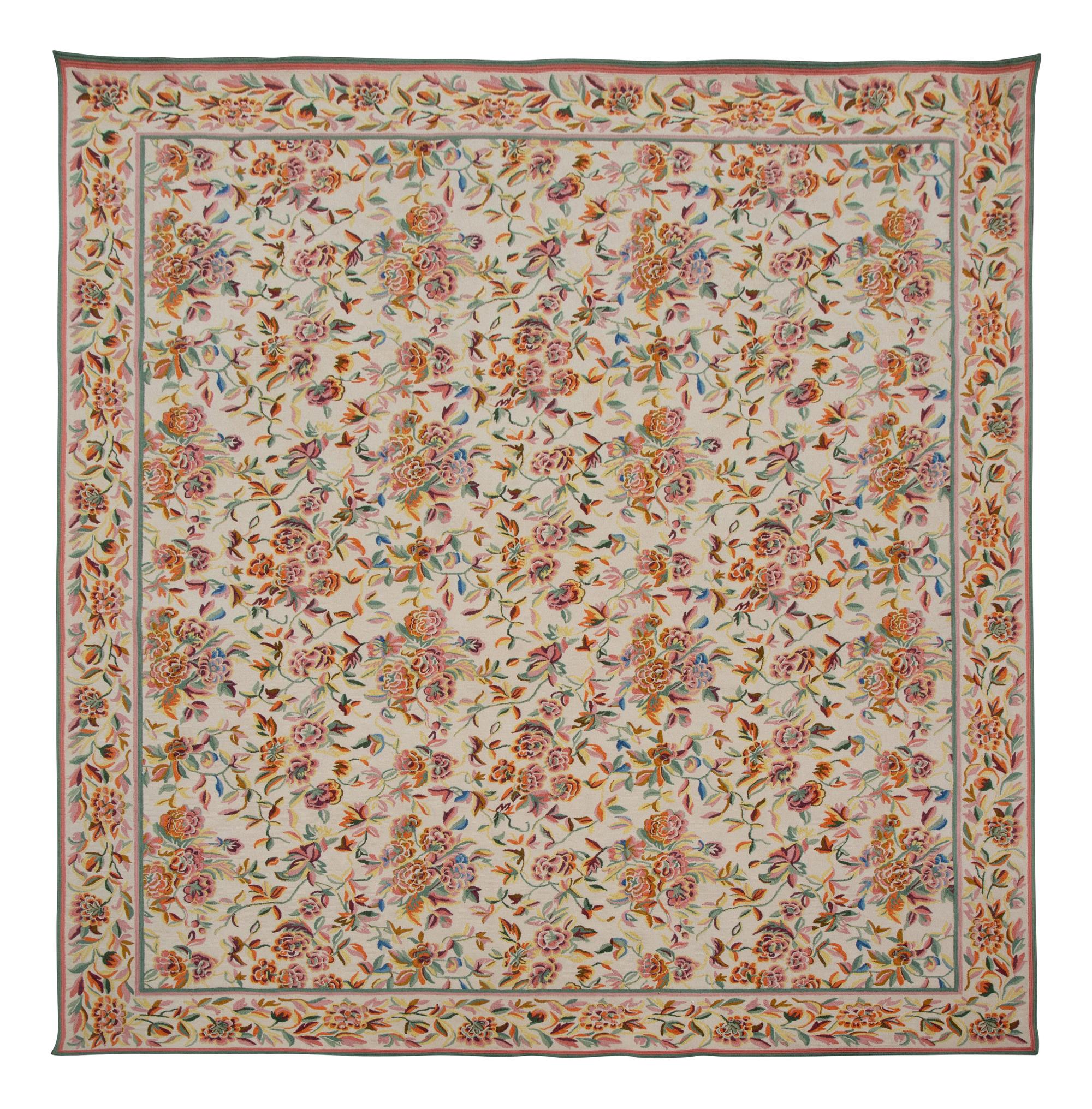 A Machine-Made Wool Floral Design Rug