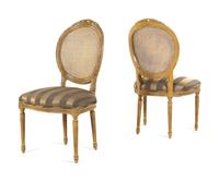 A Set of Four Louis XVI Style Caned Side Chairs